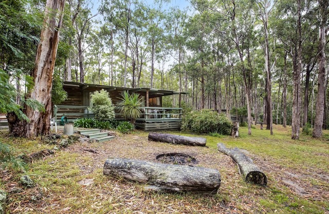 Nestled in a peaceful bush setting lies this tranquil log cabin getaway