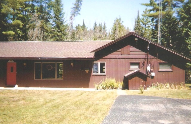 South Branch Au Sable River House in secluded wooded setting on the river.
