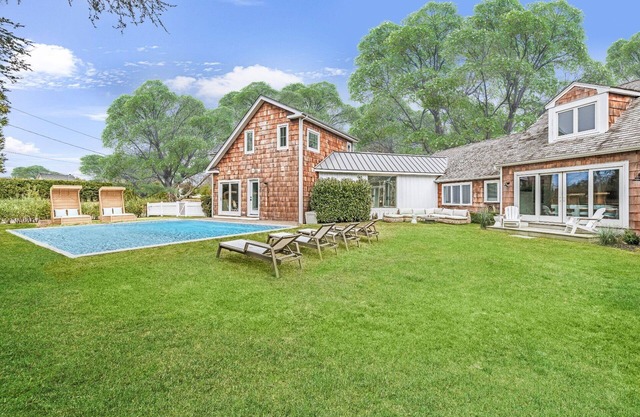 South of the highway, walking distance to town.