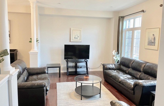 Spacious 3-Bedroom + Den Townhouse with Parking.