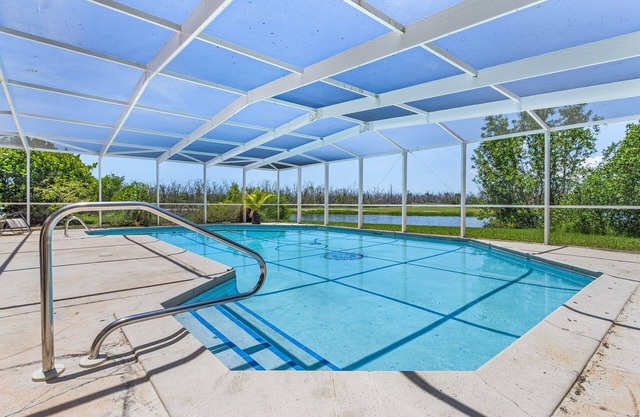 Spacious 4-Bedroom Home with Heated Pool in Sanibel - Sanderling Point - Roelens