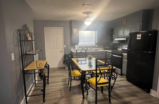 Spacious 4-bedroom house in Columbus with privacy fence situated in the county!
