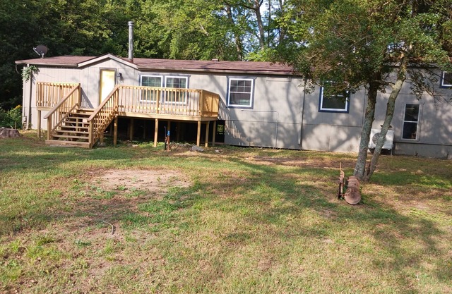 Spacious 4-bedroom mobile home 40 acres on Baron Fork 10 miles from Tahlequah