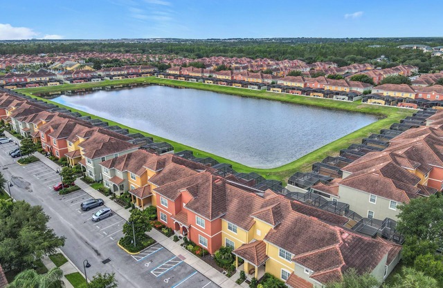 Spacious 4-bedroom townhome with fitness room and AC in lovely Kissimmee