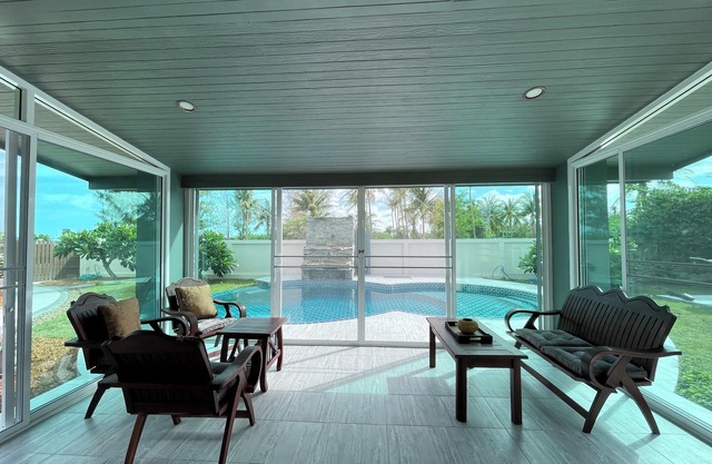 Spacious 5-bedroom beachfront in charming Kui Buri with AC, WiFi, pool. 3 villas
