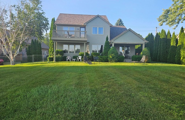 Spacious 5 Bedroom - right on the St. Clair River with private dock and frontage