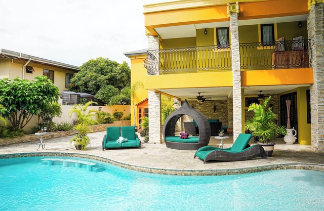 Spacious 6-bedroom house in Federation Park Port of Spain with AC, WiFi