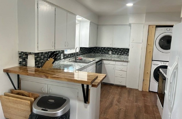 Spacious 6-bedroom, 2 kitchens, 2 living, 2 dining, 2 laundry. Bring the crew