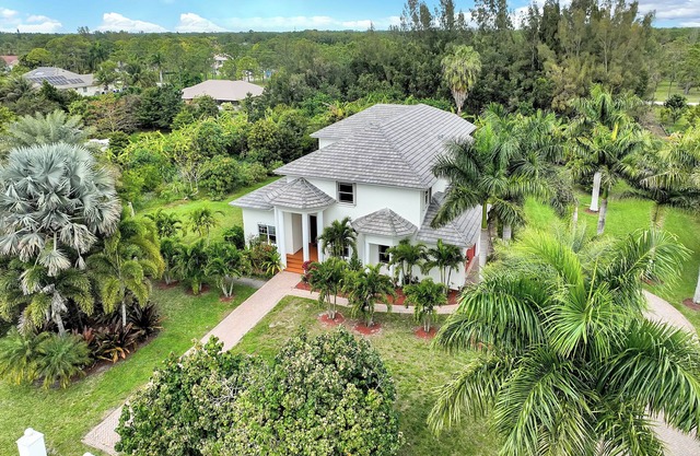 Spacious 7-bedroom house in amazing West Palm Beach with WiFi, AC