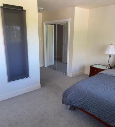 Spacious and bright bedroom with private bathroom