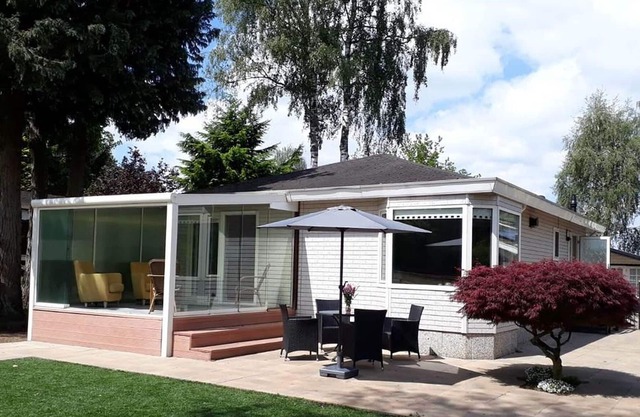 Spacious chalet with garden in Garderen