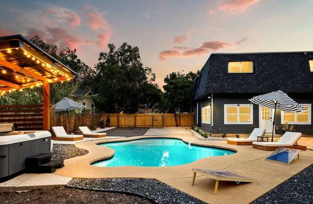 Spacious Retreat w/ Pool, Hot Tub, Game Room & 7 Smart TVs Near Downtown