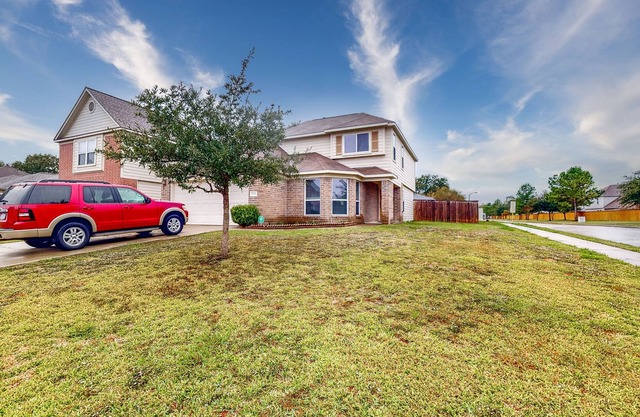 Spacious Home on Corner Lot with Gas Fireplace & Big Fenced Yard