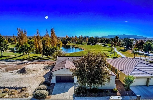 Spacious home on Mountain Falls Golf Course and minutes from the Speedway.