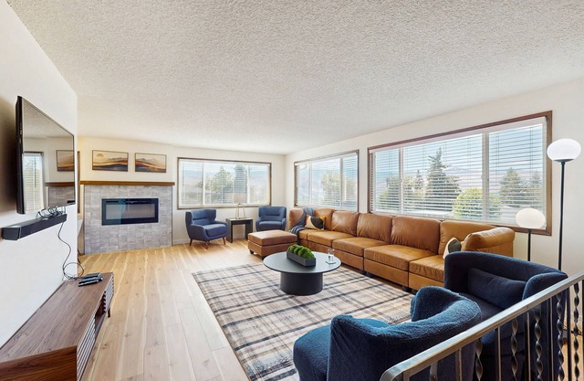 Spacious home w/ game room, private hot tub, mountain views, & bbq grill