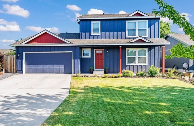 Spacious home with fenced dog-friendly yard, fireplace, central AC, W/D, WiFi