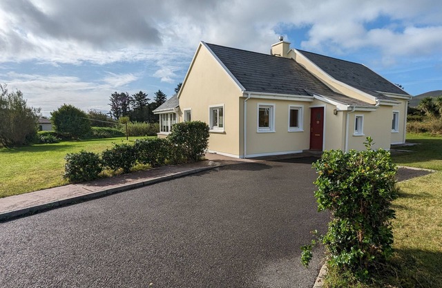 Spacious house right by the sandy, blue flag Ballinskelligs beach, pub, & cafe.