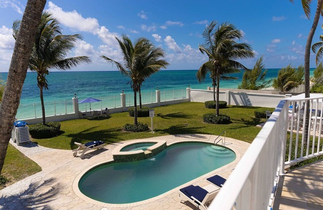 Spacious Oceanfront Estate with pool and direct access to a private beach.