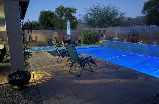 Spacious open concept rancher with private heated pool in Johnson Ranch