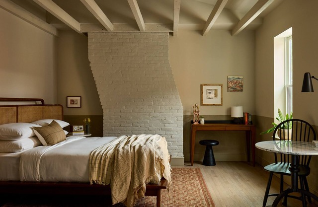 Spacious Studio Suite with Sitting Area & Local Artwork