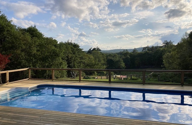 Spacious, unique home w/ mountain views. Enjoy pool in summer, skiing in winter!