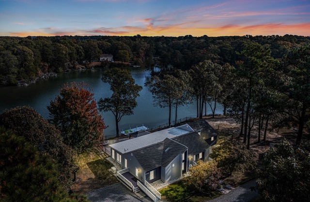 Spacious 1-level waterfront retreat w/ rec room, fenced yard. Big dogs welcome!