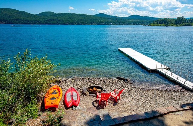 Spectacular Whitefish Lakefront home!! Private dock, paddle boards, kayak and incredible views