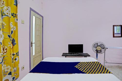SPOT ON 92564 Kemangi Asri Kost