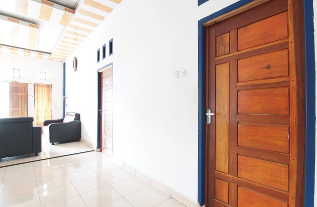 SPOT ON 93378 Lona Guest House SyariahNearScience Park Universitas Riau