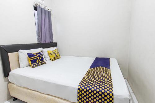 SPOT ON 93510 Penginapan Melati Tanjung Near Kantor Pengamat Pengairan Tanjung