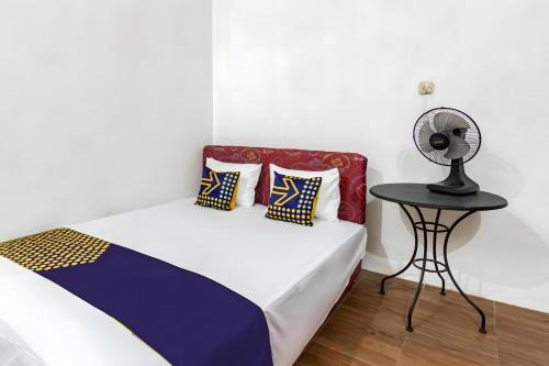 SPOT ON 93519 Kebun Manis Homestay Near Lapangan Bola Volly Batu Kumbung