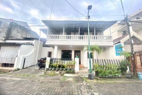 SPOT ON 93717 Nayus Homestay Syariah 4
