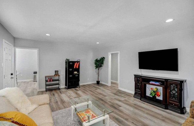 Stay in Comfort & Style: 3BR Gated Oasis with AC, Full Kitchen, and Relaxing Front Yard Patio.