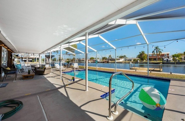 "Stay Salty" Florida Pool/Canal Home, 4 bed, 3.5 bath, bring boat!