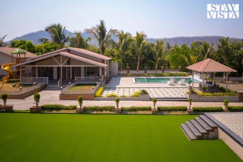 StayVista at Aura Farmstay with Pool & Lawn