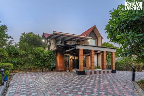 StayVista at Grandeur Living Villa with BBQ, Wi-Fi