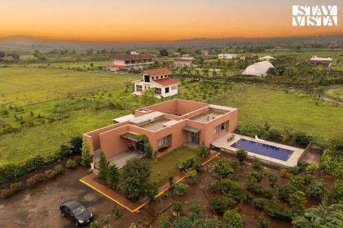 StayVista at Terracotta Skies with Courtyard & Pool