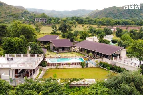 StayVista at The Earthen Boutique with Spacious Pool, Terrace, Lawn & Games