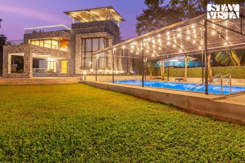 StayVista's Greystone Estate with Pool, Theater, Terrace, and Snooker Table