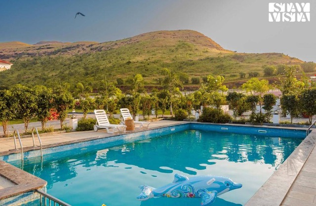 StayVista's Hill Crest Mansion - Hill-View Villa with Private Pool, Deck, Lawn & Gazebo