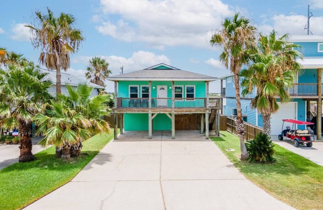 "Step into Shark Attacks and embrace the coastal charm, setting the scene for a refreshing escape. With a spacious open floor plan, it's perfect for family gatherings and unforgettable memories."