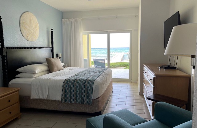 Step onto beach! Beach front 2 bed + bath condo with full kitchen, LR/DR, patio