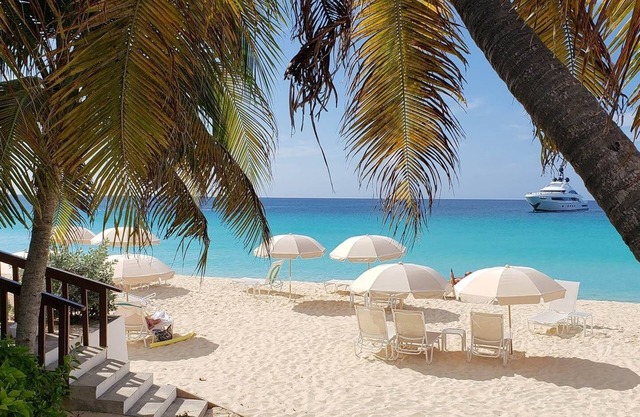 Steps Away from the Beach! Enjoy Scenic Sunset Right on Your Own Private Patio