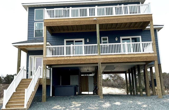 STEPS FROM THE WATER! BEAUTIFUL NEW HOME IN THE HEART OF 4x4 WILD HORSE CAROVA