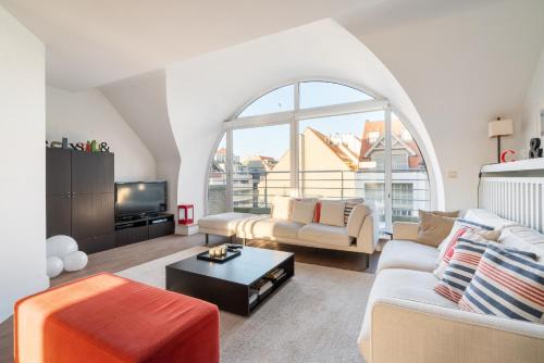 Stijlvol & lichtrijk Penthouse app met parking