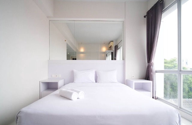 Strategic And Comfy Studio (No Kitchen) At Grand Darmo Suite Apartment