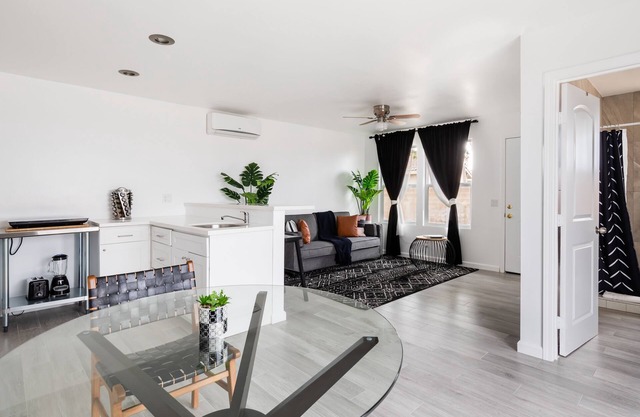 Striking Black & White Apt w Gated Entrance & Yard