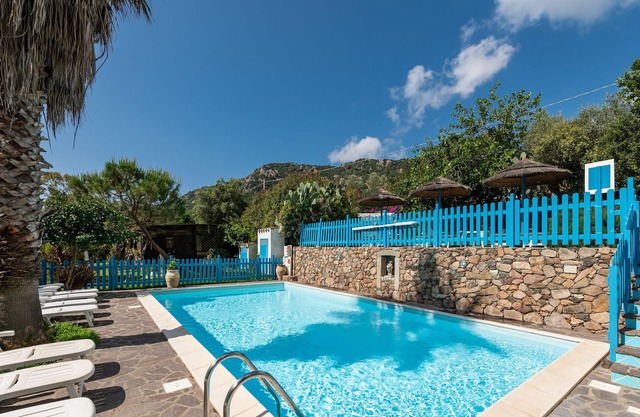 Apartamento estudio 'Agricosta Del Sud Studio1 - 4p' con piscina compartidacy jardín compartido