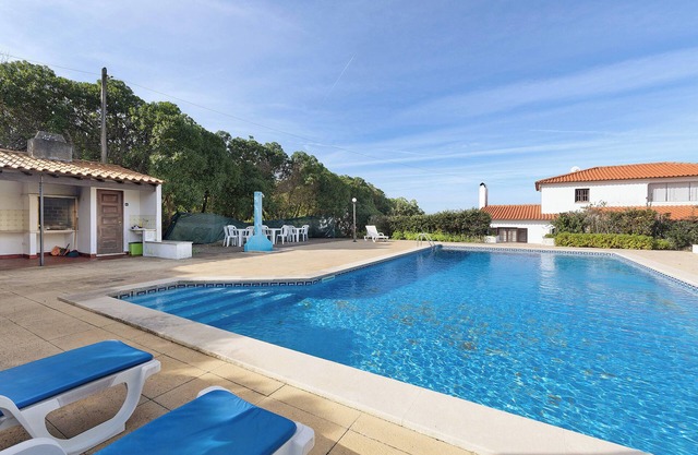 Apartamento estudio 'Estúdio Alto Da Praia' con vistas al mar, piscina compartida y Wi-Fi