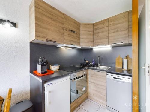 Studio cabine à 80m des pistes avec parking et balcon exposé sud - FR-1-398-643